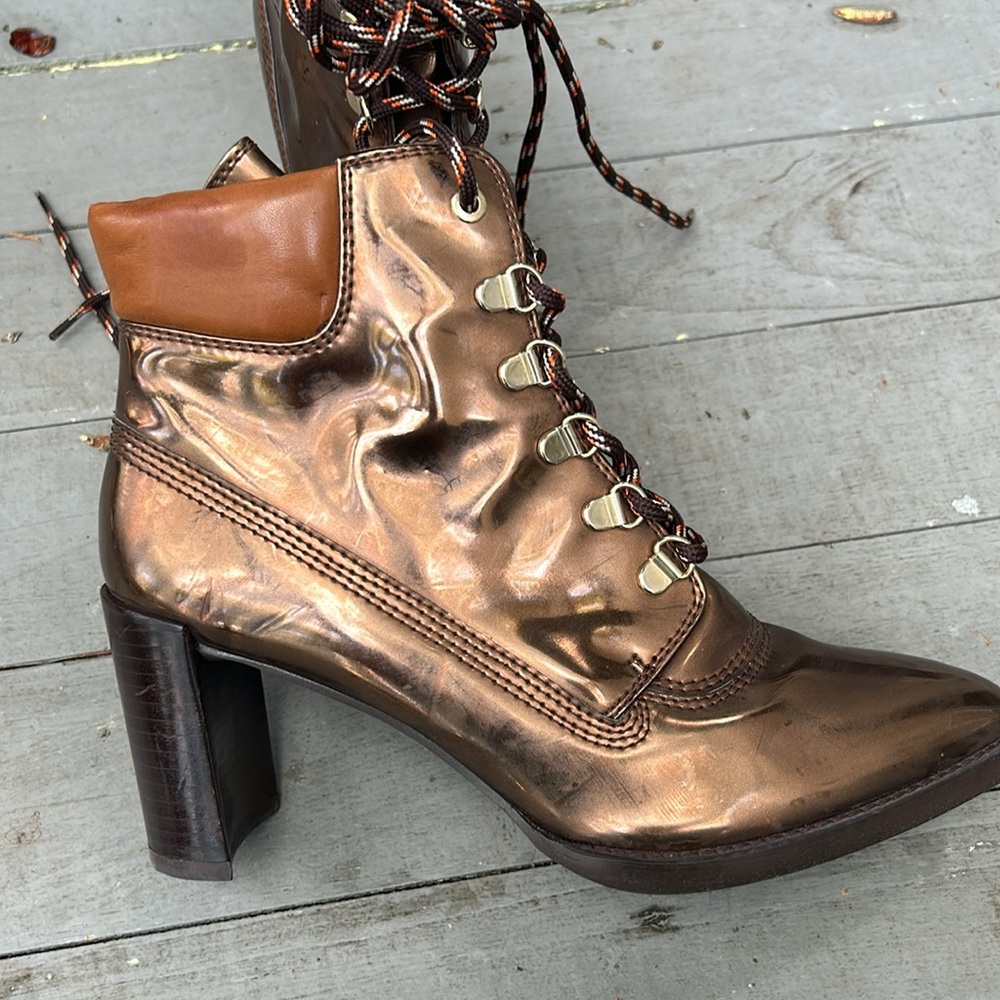 Stuart Weitzman Gigi copper metallic booties.